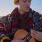 Jacob Collier Instagram - One morning at dawn, atop the roof of the O2 Arena in London, I improvised a rendition of Witness Me on the guitar! Here it is!!!!! I also happen to be playing a headline show here with the full band on Dec 9th, for 20,000 of you 🤯 see you there! Ticket link in bio 🎟️ The O2 Arena, London