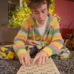 Jacob Collier Instagram - Little Blue on the harpejji! I need a haircut. Love you all!
