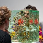 Jacob Collier Instagram – The artwork for Djesse Vol. 4 is in fact a real-life glass sculpture!! It was crafted by my brilliant maverick friend @dustinyellin – one of the most breathtaking artists currently roaming Earth. It’s built from 30 sheets of glass, glued together, and between each are placed over 3000 tiny cut-up paper people, creatures, instruments, shapes, life forms, friends, foes, relics of Djesse – in a mass smatterdom of flavour.

Having been an avid drinker of Dustin’s worlds since the dawn of Djesse, this is LITERALLY a dream come true. I urge you to feast on the plentiful spoils of his universe that exist in the world and across the interwebs.

And if you want to have a look around – a fully explorable virtual model of this sculpture exists over at jacobcollier.com! Easter eggs abound. Enough for everybody. Help yourself.

Djesse Vol. 4 is out on February 29th – 3 weeks today – and I have never been more excited in my life. More soon.