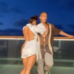 Jade Chynoweth Instagram - Sailing around the world together 🛥️ 🌊 #boatdaddy Lito wearing his Jade Stone 1s x @fuego.dance