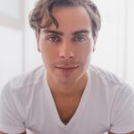 Jake T. Austin Instagram - ¿Como está España ? I know this hasn’t been a “regular” Summer and I wanted to catchup with all of you. My conversation with @primerafilarevista is linked in my IG Story Highlight. BTW, this photo was a quick snapshot taken in my stairway by @mitchdao.photos and I did my own hair using Oribe (@oribe) and skincare by Kiehl’s (@kiehls ). Even in trying times, creativity can grow... just let the light in. #summer2020 #movingforward Hollywood, California