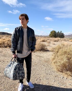 Jake T. Austin Instagram - Open spaces, limitless possibilities. 
Duffel: @packsproject
A portion of their proceeds go to help raise awareness and funds for education relief in developing nations. 
#knowledgeispower #packsproject 🧳💭📖