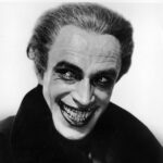 James Gunn Instagram – Conrad Veidt in Paul Leni’s “The Man Who Laughs” (1928), based on Victor Hugo’s novel. The film was a silent romantic melodrama – Veidt’s character was the hero; the smile was carved into his face as a boy by a Comprachico (a fictional group of people who reshaped the physical appearance of children like a pruner would a Bonsai tree). Bill Finger, Bob Kane & Jerry Robinson couldn’t agree on much but they all agreed Veidt’s portrayal was the inspiration for the Joker in the comics.