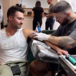 James Maslow Instagram - I will fear no evil- לֹא אִירָא רָע 🪬 💀🦋💀🦋 This tattoo melds the stark reality of a skull with the dynamic presence of a butterfly to convey a message of life’s resilience and continuity. The skull, a representation of life’s inevitable conclusion, contrasts with the butterfly, traditionally seen as a symbol of change and endurance, embodying the human spirit’s ability to adapt and survive. As the butterfly confronts its reflection on the skull, it prompts a reflection on our own journey through life’s challenges, underscoring the strength and tenacity inherent in our nature. This design is a bold testament to the unyielding cycle of existence. @jamesmaslow explained AND I Executed 💀🦋 Tel-Aviv, Israel
