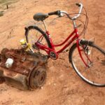 James May Instagram – The artist ironically juxtaposes the bicycle with the rusting remains of an unwanted internal combustion engine (estimate £20,000 – 30,000)