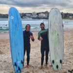 James Phelps Instagram - "Checking out the surf mate". Great seeing and thanks to my old mate @dannyclayton and @tacoshelly for the surf lesson. I did end up drinking half the ocean after one (dare I say) epic wipe out...and loved every second of it 🤙🏄‍♂️🌊 #surf #surfing #adventureseeker #onlygoodvibes #pitted Bondi beach, Sydney, Australia.