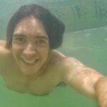James Phelps Instagram - Whilst out on the SUP recently (still trying to master the step back turn, and falling in a lot) I decided to dive in. Turns out the water is still warm(ish) this time of year. #tb #sup #spash #blubblubblub