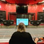 Jamie Campbell Bower Instagram – There’s always something special about being able to mix up an analogue desk. Here’s me at 2am going through @mikeydemus sexy blues playing prior to locking in on the levels and eq at the desk. Also MERCH DROP TOMORROW. Somewhereintheshadows.com