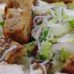 Jamie Oliver Instagram - This salad is one of my ultimate favourites and I know you guys love it too. Its my superfood version of the iconic chicken Caesar salad ! Using yoghurt in the dressing instead of mayonnaise instantly reduces the saturated fats by 90% which is a total win. Not forgetting to mention that the finely sliced cauliflower isn’t just delicious, but when it’s eaten raw we get twice as much vitamin B6 and three times as much potassium keeping our nervous systems healthy !! Recipe in my bio x x x #caesarsalad #dinnerideas #salad