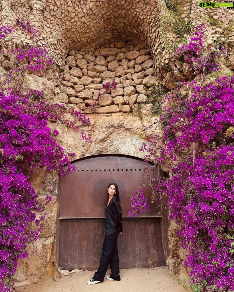 Jasmine Curtis-Smith Instagram - Buenos Dias 🌺 Park Güell blooming throughout spring and summer, abundantly framing a rusting door and weaving amongst the rock columns and structures. 💜 Funny little kwento – while strolling about this area, everyone was focused on getting into the Park’s main scenic view spot/square to take photos on that side for the view of BCN. @tracyayson and I loooooved the framing of these bougainvilleas so we snapped a few shots without us in the frame, next thing you know a line was formed behind her and an old American couple negotiated and insisted an exchange - “Take our photo, and I’ll take yours!” Sabay abot ng phone at puesto sa flowers just as I was about to walk for this shot. No need for a response daw 😄 #JCStrips