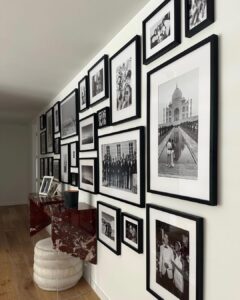 Jasmine Tookes Instagram - The second I saw this wall, I knew It was the perfect place to create a gallery wall filled with some our most amazing memories. @framebridge made this process so smooth & helped bring my vision to life.