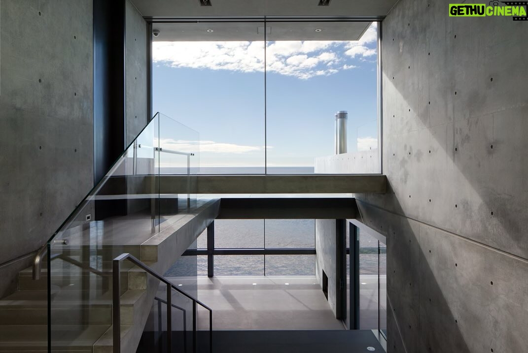 Jason Oppenheim Instagram - Coming Soon in Malibu - 24844 Malibu Rd. - $53,000,000 An architectural tour de force and only one of the few private homes in the United States designed by the renowned Pritzker Prize-winning Japanese architect, Tadao Ando. Best known for his minimalist structures and his assured use of reinforced concrete, Ando’s trademark design of “smooth-as-silk” concrete is wholly present in the structure and surface of the home. Constructed of approximately 1,200 tons of concrete, 200 tons of steel reinforcement, and 12 massive pylons driven more than 60 feet into the sand with AD100 architecture firm Marmol Radziner acting as executive architect and general contractor, the structure is an everlasting beacon of permanence on California’s coastline. Natural light is used creatively throughout the space, another signature of Ando, to manipulate a warm feeling throughout the building and harmonize with its natural surroundings. The home spans +/- 4,000 sq. ft. of interior space and approximately 1,500 sq. ft. of outdoor decks with ocean views from every room. Currently all interior finishes have been removed from the property, and work is needed to either restore or reimagine the interiors. Thoughtfully located on the prestigious and quiet Malibu Road, with easy access and close proximity to the finest restaurants, shopping, and entertainment in all of Malibu. An exceedingly rare architectural achievement that should be seen as a masterful work of art, rather than just a residence. Malibu Beach