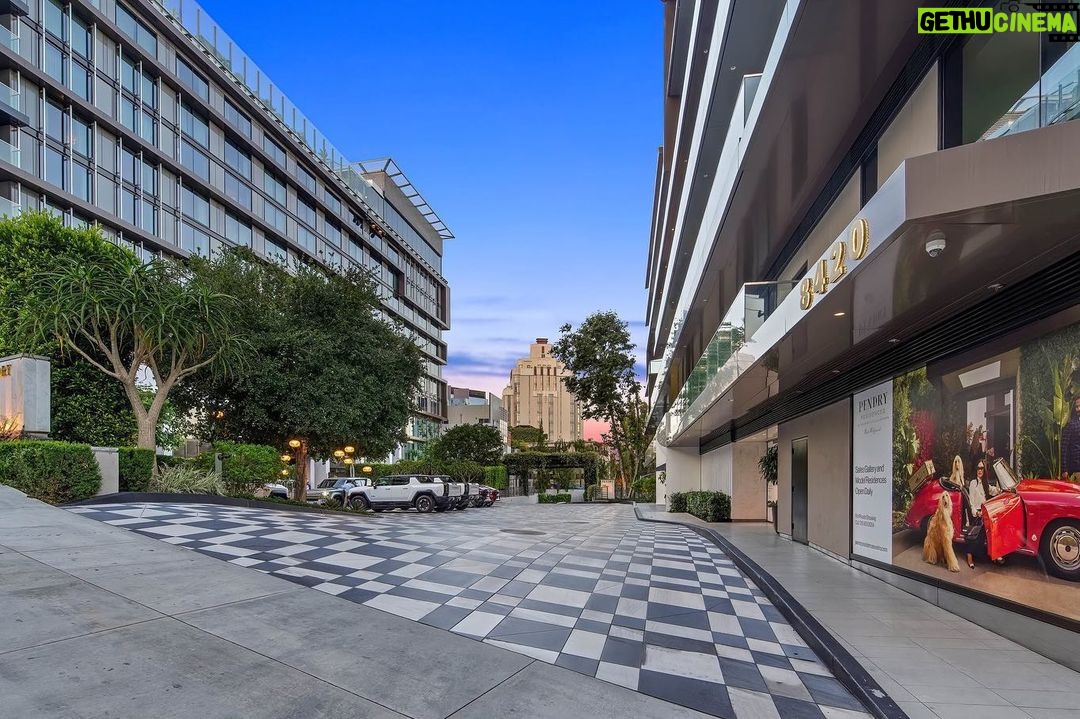 Jason Oppenheim Instagram - Just Listed - The Pendry Residences #307 - $4,195,000 2 Beds / 3 Baths / 2,393 Sq. Ft. Immerse yourself in luxury at the Pendry Residences, a 24-hour full-service amenity building, located on the iconic Sunset Strip in West Hollywood. Residence 307 offers unparalleled privacy with breathtaking south-facing Downtown LA views. Serene and sophisticated, the home exudes an opulent ambiance with wide plank white oak flooring and floor-to-ceiling glass walls that bathe the space in natural light. The chef's kitchen, designed by Martin Brudnizki, is the perfect blend of functionality and elegance equipped with top-of-the-line Subzero and Wolf appliances, custom white oak stained cabinetry, Waterworks fixtures, and an oversized Calacata Borghini marble island. The generously sized primary suite is a haven of luxury, featuring a customized Poliform walk-in closet and a marble spa-like bathroom with custom double vanities and high-end polished chrome fixtures. Completing the residence are a guest bedroom with en-suite bath, powder room, laundry room, in-wall speakers, direct access via a private elevator, and two side-by-side parking spaces equipped with a triple charger. The Pendry Residences offers a range of residential amenities, including 24-hour concierge and security services, valet parking, a state-of-the-art fitness center, a resident lounge, a tranquil garden deck, a rooftop pool, and services of the Pendry Hotel. West Hollywood, California