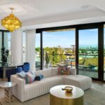 Jason Oppenheim Instagram - Just Listed - The Pendry Residences #307 - $4,195,000 2 Beds / 3 Baths / 2,393 Sq. Ft. Immerse yourself in luxury at the Pendry Residences, a 24-hour full-service amenity building, located on the iconic Sunset Strip in West Hollywood. Residence 307 offers unparalleled privacy with breathtaking south-facing Downtown LA views. Serene and sophisticated, the home exudes an opulent ambiance with wide plank white oak flooring and floor-to-ceiling glass walls that bathe the space in natural light. The chef's kitchen, designed by Martin Brudnizki, is the perfect blend of functionality and elegance equipped with top-of-the-line Subzero and Wolf appliances, custom white oak stained cabinetry, Waterworks fixtures, and an oversized Calacata Borghini marble island. The generously sized primary suite is a haven of luxury, featuring a customized Poliform walk-in closet and a marble spa-like bathroom with custom double vanities and high-end polished chrome fixtures. Completing the residence are a guest bedroom with en-suite bath, powder room, laundry room, in-wall speakers, direct access via a private elevator, and two side-by-side parking spaces equipped with a triple charger. The Pendry Residences offers a range of residential amenities, including 24-hour concierge and security services, valet parking, a state-of-the-art fitness center, a resident lounge, a tranquil garden deck, a rooftop pool, and services of the Pendry Hotel. West Hollywood, California