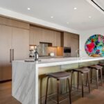 Jason Oppenheim Instagram - Just Listed - The Pendry Residences #307 - $4,195,000 2 Beds / 3 Baths / 2,393 Sq. Ft. Immerse yourself in luxury at the Pendry Residences, a 24-hour full-service amenity building, located on the iconic Sunset Strip in West Hollywood. Residence 307 offers unparalleled privacy with breathtaking south-facing Downtown LA views. Serene and sophisticated, the home exudes an opulent ambiance with wide plank white oak flooring and floor-to-ceiling glass walls that bathe the space in natural light. The chef's kitchen, designed by Martin Brudnizki, is the perfect blend of functionality and elegance equipped with top-of-the-line Subzero and Wolf appliances, custom white oak stained cabinetry, Waterworks fixtures, and an oversized Calacata Borghini marble island. The generously sized primary suite is a haven of luxury, featuring a customized Poliform walk-in closet and a marble spa-like bathroom with custom double vanities and high-end polished chrome fixtures. Completing the residence are a guest bedroom with en-suite bath, powder room, laundry room, in-wall speakers, direct access via a private elevator, and two side-by-side parking spaces equipped with a triple charger. The Pendry Residences offers a range of residential amenities, including 24-hour concierge and security services, valet parking, a state-of-the-art fitness center, a resident lounge, a tranquil garden deck, a rooftop pool, and services of the Pendry Hotel. West Hollywood, California
