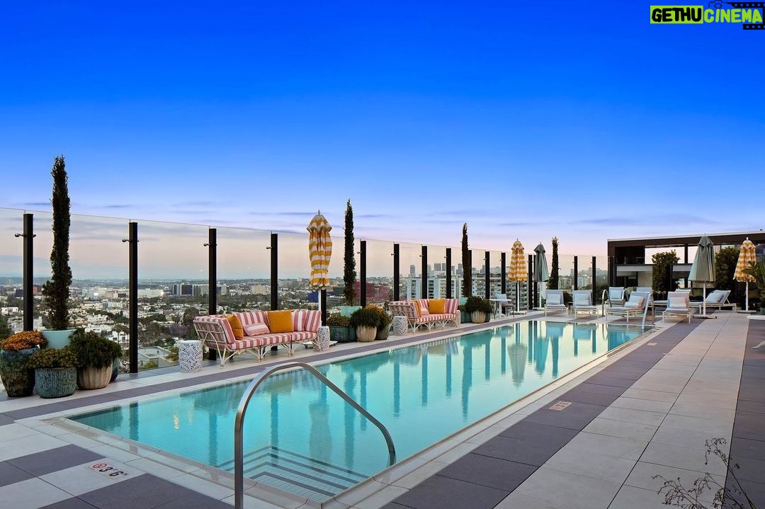 Jason Oppenheim Instagram - Just Listed - The Pendry Residences #307 - $4,195,000 2 Beds / 3 Baths / 2,393 Sq. Ft. Immerse yourself in luxury at the Pendry Residences, a 24-hour full-service amenity building, located on the iconic Sunset Strip in West Hollywood. Residence 307 offers unparalleled privacy with breathtaking south-facing Downtown LA views. Serene and sophisticated, the home exudes an opulent ambiance with wide plank white oak flooring and floor-to-ceiling glass walls that bathe the space in natural light. The chef's kitchen, designed by Martin Brudnizki, is the perfect blend of functionality and elegance equipped with top-of-the-line Subzero and Wolf appliances, custom white oak stained cabinetry, Waterworks fixtures, and an oversized Calacata Borghini marble island. The generously sized primary suite is a haven of luxury, featuring a customized Poliform walk-in closet and a marble spa-like bathroom with custom double vanities and high-end polished chrome fixtures. Completing the residence are a guest bedroom with en-suite bath, powder room, laundry room, in-wall speakers, direct access via a private elevator, and two side-by-side parking spaces equipped with a triple charger. The Pendry Residences offers a range of residential amenities, including 24-hour concierge and security services, valet parking, a state-of-the-art fitness center, a resident lounge, a tranquil garden deck, a rooftop pool, and services of the Pendry Hotel. West Hollywood, California