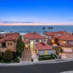 Jason Oppenheim Instagram - Just Listed - 22 Ritz Cove - $15,900,000 5 Beds / 5 Baths / 5,502 Sq. Ft. / 9,660 Lot Size Welcome to this exquisite oceanfront residence situated in the guard-gated community of Ritz Cove, one of the most sought-after coastal communities in Orange County where unrivaled luxury and exclusivity converge. Nestled between the iconic Ritz Carlton luxury hotel and the Monarch Beach Golf Course, this one-of-a-kind beachfront property offers breathtaking year-round views of sunsets over the break at Salt Creek Beach and Catalina Island from nearly every room in the home. Upon entering, you are enveloped by the welcoming, bright and airy floor plan and feel instantly at peace in your own private oasis. Five bedrooms and five bathrooms are spread across two levels, and a bonus room provides the flexibility to create a home office, media room, or gym. The large curved glass window in the kitchen invites the ocean inside, while the attached living room space creates an entertaining paradise that opens up onto the private patio with spa, setting the perfect stage for outdoor gatherings and sophisticated entertaining. The master suite is a true sanctuary, featuring an expansive bedroom and private balcony with sweeping views of the Pacific Ocean and the Ritz Carlton. The master bath boasts a lavish soaking tub for two, a separate shower, and exquisite dual vanities, all under a skylight that bathes the room in a glowing light. The suite extends into an extensive private master closet space apportioned with all the necessary amenities, including a 3-way mirror and attached locking closet. Additionally, a private stairway with a private gated entrance grants direct access to the pristine beach and countless walking trails directly from the backyard. This breathtaking beachfront property presents an unparalleled opportunity for a personal haven of relaxation and entertaining while offering the most captivating ocean and white-water views. Co-listed with @katinreinhardt Dana Point