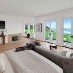 Jason Oppenheim Instagram - Just Listed - 22 Ritz Cove - $15,900,000 5 Beds / 5 Baths / 5,502 Sq. Ft. / 9,660 Lot Size Welcome to this exquisite oceanfront residence situated in the guard-gated community of Ritz Cove, one of the most sought-after coastal communities in Orange County where unrivaled luxury and exclusivity converge. Nestled between the iconic Ritz Carlton luxury hotel and the Monarch Beach Golf Course, this one-of-a-kind beachfront property offers breathtaking year-round views of sunsets over the break at Salt Creek Beach and Catalina Island from nearly every room in the home. Upon entering, you are enveloped by the welcoming, bright and airy floor plan and feel instantly at peace in your own private oasis. Five bedrooms and five bathrooms are spread across two levels, and a bonus room provides the flexibility to create a home office, media room, or gym. The large curved glass window in the kitchen invites the ocean inside, while the attached living room space creates an entertaining paradise that opens up onto the private patio with spa, setting the perfect stage for outdoor gatherings and sophisticated entertaining. The master suite is a true sanctuary, featuring an expansive bedroom and private balcony with sweeping views of the Pacific Ocean and the Ritz Carlton. The master bath boasts a lavish soaking tub for two, a separate shower, and exquisite dual vanities, all under a skylight that bathes the room in a glowing light. The suite extends into an extensive private master closet space apportioned with all the necessary amenities, including a 3-way mirror and attached locking closet. Additionally, a private stairway with a private gated entrance grants direct access to the pristine beach and countless walking trails directly from the backyard. This breathtaking beachfront property presents an unparalleled opportunity for a personal haven of relaxation and entertaining while offering the most captivating ocean and white-water views. Co-listed with @katinreinhardt Dana Point