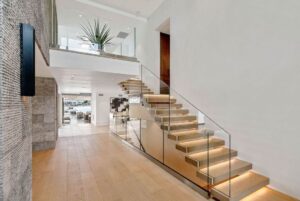 Jason Oppenheim Instagram - Just Listed - 2201 Bayside Dr. - $27,995,000

5 Beds / 9 Baths / 9,129 Sq. Ft. / 11,921 Lot Size

This newly constructed custom estate offers exclusive Corona Del Mar waterfront living with intricate design touches and a harmonious blend of natural stone and wood elements. Consisting of 5 ensuite bedrooms and 9 bathrooms and boasting approximately 50 feet of private beachfront, it caters to water enthusiasts and offers shared ownership of one of the longest private docks on the west coast, capable of accommodating multiple yachts up to 100ft in length. Upon arrival, you will be greeted by meticulously landscaped surroundings, a striking grand pivot door, and a double height foyer that sets the tone for the residence. Inside, the space boasts European wide plank bleached oak flooring by Gaetano, illuminated floating staircases, and expansive glass features that fill the approximately 9,129 square feet of interiors with an abundance of natural light. The property seamlessly connects to its surroundings through slide-away pocket doors that open onto a heated patio, a zero-edge saltwater pool and spa, and a courtyard featuring a built-in Lynx Grill. The kitchen features custom Honed Calcatta Vagli slab countertops and backsplash, a 55" La Canche designer stove imported from Paris, a butler's pantry, and stained white oak cabinetry. Convenience is paramount, with a Waupaca elevator servicing all four floors, including the lower level, which encompasses a media area, a dry bar, and temperature controlled wine room. Upstairs, the owner's suite presents a heated wraparound balcony with mesmerizing water views, a living space with a fireplace, and two spa-like bathrooms, each complemented by its own walk-in closet. The top level reveals a lounge area that opens onto a rooftop deck with grass and sweeping views of the Newport Beach Harbor offering limitless ocean-view entertaining. Equipped with cutting-edge technology, the property also includes a nearly 3,000 sq. ft., 6+ car garage with epoxy flooring.

Listed by 
@briancharlesfurstenfeld
@mskaylacardona
@jasonoppenheim