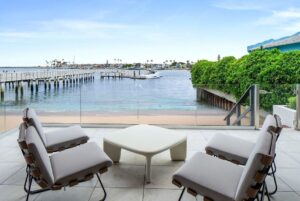 Jason Oppenheim Instagram - Just Listed - 2201 Bayside Dr. - $27,995,000

5 Beds / 9 Baths / 9,129 Sq. Ft. / 11,921 Lot Size

This newly constructed custom estate offers exclusive Corona Del Mar waterfront living with intricate design touches and a harmonious blend of natural stone and wood elements. Consisting of 5 ensuite bedrooms and 9 bathrooms and boasting approximately 50 feet of private beachfront, it caters to water enthusiasts and offers shared ownership of one of the longest private docks on the west coast, capable of accommodating multiple yachts up to 100ft in length. Upon arrival, you will be greeted by meticulously landscaped surroundings, a striking grand pivot door, and a double height foyer that sets the tone for the residence. Inside, the space boasts European wide plank bleached oak flooring by Gaetano, illuminated floating staircases, and expansive glass features that fill the approximately 9,129 square feet of interiors with an abundance of natural light. The property seamlessly connects to its surroundings through slide-away pocket doors that open onto a heated patio, a zero-edge saltwater pool and spa, and a courtyard featuring a built-in Lynx Grill. The kitchen features custom Honed Calcatta Vagli slab countertops and backsplash, a 55" La Canche designer stove imported from Paris, a butler's pantry, and stained white oak cabinetry. Convenience is paramount, with a Waupaca elevator servicing all four floors, including the lower level, which encompasses a media area, a dry bar, and temperature controlled wine room. Upstairs, the owner's suite presents a heated wraparound balcony with mesmerizing water views, a living space with a fireplace, and two spa-like bathrooms, each complemented by its own walk-in closet. The top level reveals a lounge area that opens onto a rooftop deck with grass and sweeping views of the Newport Beach Harbor offering limitless ocean-view entertaining. Equipped with cutting-edge technology, the property also includes a nearly 3,000 sq. ft., 6+ car garage with epoxy flooring.

Listed by 
@briancharlesfurstenfeld
@mskaylacardona
@jasonoppenheim