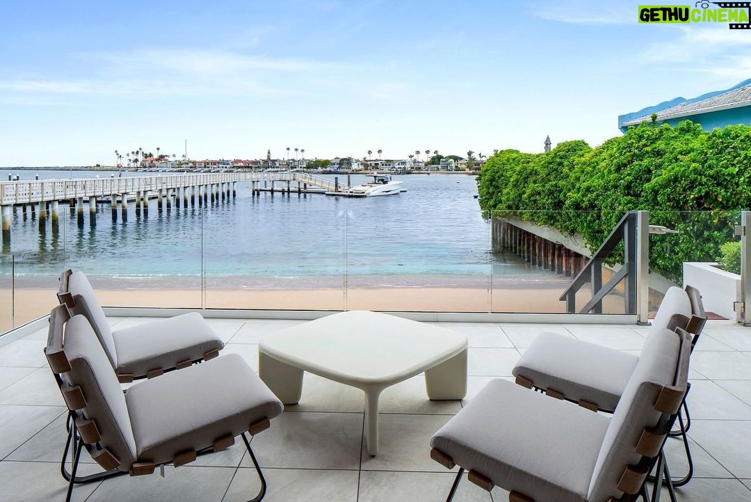 Jason Oppenheim - 53.2K Likes - Just Listed - 2201 Bayside Dr. - $27,995,000
5 Beds / 9 Baths / 9,129 Sq. Ft. / 11,921 Lot Size
This newly constructed custom estate offers exclusive Corona Del Mar waterfront living with intricate design touches and a harmonious blend of natural stone and wood elements. Consisting of 5 ensuite bedrooms and 9 bathrooms and boasting approximately 50 feet of private beachfront, it caters to water enthusiasts and offers shared ownership of one of the longest private docks on the west coast, capable of accommodating multiple yachts up to 100ft in length. Upon arrival, you will be greeted by meticulously landscaped surroundings, a striking grand pivot door, and a double height foyer that sets the tone for the residence. Inside, the space boasts European wide plank bleached oak flooring by Gaetano, illuminated floating staircases, and expansive glass features that fill the approximately 9,129 square feet of interiors with an abundance of natural light. The property seamlessly connects to its surroundings through slide-away pocket doors that open onto a heated patio, a zero-edge saltwater pool and spa, and a courtyard featuring a built-in Lynx Grill. The kitchen features custom Honed Calcatta Vagli slab countertops and backsplash, a 55" La Canche designer stove imported from Paris, a butler's pantry, and stained white oak cabinetry. Convenience is paramount, with a Waupaca elevator servicing all four floors, including the lower level, which encompasses a media area, a dry bar, and temperature controlled wine room. Upstairs, the owner's suite presents a heated wraparound balcony with mesmerizing water views, a living space with a fireplace, and two spa-like bathrooms, each complemented by its own walk-in closet. The top level reveals a lounge area that opens onto a rooftop deck with grass and sweeping views of the Newport Beach Harbor offering limitless ocean-view entertaining. Equipped with cutting-edge technology, the property also includes a nearly 3,000 sq. ft., 6+ car garage with epoxy flooring.
Listed by
@briancharlesfurstenfeld
@mskaylacardona
@jasonoppenheim