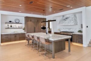 Jason Oppenheim Instagram - Just Listed - 2201 Bayside Dr. - $27,995,000

5 Beds / 9 Baths / 9,129 Sq. Ft. / 11,921 Lot Size

This newly constructed custom estate offers exclusive Corona Del Mar waterfront living with intricate design touches and a harmonious blend of natural stone and wood elements. Consisting of 5 ensuite bedrooms and 9 bathrooms and boasting approximately 50 feet of private beachfront, it caters to water enthusiasts and offers shared ownership of one of the longest private docks on the west coast, capable of accommodating multiple yachts up to 100ft in length. Upon arrival, you will be greeted by meticulously landscaped surroundings, a striking grand pivot door, and a double height foyer that sets the tone for the residence. Inside, the space boasts European wide plank bleached oak flooring by Gaetano, illuminated floating staircases, and expansive glass features that fill the approximately 9,129 square feet of interiors with an abundance of natural light. The property seamlessly connects to its surroundings through slide-away pocket doors that open onto a heated patio, a zero-edge saltwater pool and spa, and a courtyard featuring a built-in Lynx Grill. The kitchen features custom Honed Calcatta Vagli slab countertops and backsplash, a 55" La Canche designer stove imported from Paris, a butler's pantry, and stained white oak cabinetry. Convenience is paramount, with a Waupaca elevator servicing all four floors, including the lower level, which encompasses a media area, a dry bar, and temperature controlled wine room. Upstairs, the owner's suite presents a heated wraparound balcony with mesmerizing water views, a living space with a fireplace, and two spa-like bathrooms, each complemented by its own walk-in closet. The top level reveals a lounge area that opens onto a rooftop deck with grass and sweeping views of the Newport Beach Harbor offering limitless ocean-view entertaining. Equipped with cutting-edge technology, the property also includes a nearly 3,000 sq. ft., 6+ car garage with epoxy flooring.

Listed by 
@briancharlesfurstenfeld
@mskaylacardona
@jasonoppenheim