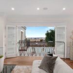 Jason Oppenheim Instagram - Just Listed Above The Sunset Strip - 1447 Queens Rd. - $3,495,000 2 Bed / 3 Bath / 2,307 Sq. Ft. Experience the epitome of glamour and sophistication with this stunningly restored Hollywood Regency replete with city views. Originally built by Robert Woolf alongside his partner, the legendary architect John Woolf, for their own personal residence, this property has recently undergone an artful restoration by renowned designer Tim Corrigan. Every detail has been meticulously considered to create an ultra-luxurious, alluring, and simply timeless atmosphere. Enter past the gated brick courtyard with fountain into the quintessential foyer featuring gorgeous black-and-white checkered marble floors. The main floor boasts a sitting room with beautiful crown molding and fireplace, along with an exquisite powder room with inlaid brass walls and an intricate one-of-a-kind medallion marble floor. The home has dual master suites (one on each floor) each equipped with their own ensuite baths that are strikingly finished with his-and-her sinks, built-in brass/silver fixtures, huge slabs of stone, and a plethora of closet space. Ascend the original brass railing staircase to the salon room, which features a second fireplace, French doors, and breathtaking city views. The large dining area and European kitchen with top-of-the-line appliances and backlit stone backsplash are perfect for entertaining. Outside, the private yard features a large pool, built-in BBQ, and mature hedging. A finished basement, along with a finished 2-car garage with French doors that lead to the yard, complete this remarkable property. Don’t miss this rare opportunity to own one of the most elegant and historic homes in Los Angeles.