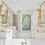 Jason Oppenheim Instagram - Just Listed Above The Sunset Strip - 1447 Queens Rd. - $3,495,000 2 Bed / 3 Bath / 2,307 Sq. Ft. Experience the epitome of glamour and sophistication with this stunningly restored Hollywood Regency replete with city views. Originally built by Robert Woolf alongside his partner, the legendary architect John Woolf, for their own personal residence, this property has recently undergone an artful restoration by renowned designer Tim Corrigan. Every detail has been meticulously considered to create an ultra-luxurious, alluring, and simply timeless atmosphere. Enter past the gated brick courtyard with fountain into the quintessential foyer featuring gorgeous black-and-white checkered marble floors. The main floor boasts a sitting room with beautiful crown molding and fireplace, along with an exquisite powder room with inlaid brass walls and an intricate one-of-a-kind medallion marble floor. The home has dual master suites (one on each floor) each equipped with their own ensuite baths that are strikingly finished with his-and-her sinks, built-in brass/silver fixtures, huge slabs of stone, and a plethora of closet space. Ascend the original brass railing staircase to the salon room, which features a second fireplace, French doors, and breathtaking city views. The large dining area and European kitchen with top-of-the-line appliances and backlit stone backsplash are perfect for entertaining. Outside, the private yard features a large pool, built-in BBQ, and mature hedging. A finished basement, along with a finished 2-car garage with French doors that lead to the yard, complete this remarkable property. Don’t miss this rare opportunity to own one of the most elegant and historic homes in Los Angeles.