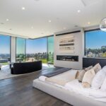 Jason Oppenheim Instagram - 📍 9406 Lloycrest Dr. Just reduced $6 million and now currently offered at $12,995,000, it is the best-priced home in Beverly Hills. 5 Beds / 9 Baths / 10,359 Sq. Ft. Located in the prestigious Crest Streets in Beverly Hills, this architectural masterpiece offers unobstructed jetliner views from every room. The new construction smart house features Venetian wall finishes throughout, imported stonework, floor-to-ceiling walls and doors of glass, and over 3,400 sq. ft. of outdoor terraces, creating an unprecedented living experience. The 2,000 sq. ft. primary suite boasts a private glam room, hair salon, 2 garden lounge sitting areas, dual walk-in closets, wet bar, and glass shoe display room. The gourmet kitchen comes replete with a butler kitchen and pantry area. The sophisticated living and dining area is accentuated with a fingerprint-secured Mezcal/Wine tasting room. The lower entertainment level offers a luxurious bar, spa and theatre experience, including a zero-edge pool, Himalayan salt sauna, Japanese soaking tub, private yoga studio/gym, Tonal fitness system, wet steam room, poolside cabana room, and 20 person theater with bar. The private lower grassy yard is surrounded by lush landscaping and includes a large entertainment game space. Co-listed with @alexanderhuerta_ @emmahernan Beverly Hills, California