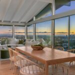 Jason Oppenheim Instagram - Just Listed - 8700 Franklin Ave. - $4,995,000 3 Bed / 3 Baths / 2,766 Sq. Ft. / 16,384 Lot Size Situated on its own promontory at the end of a quiet cul-de-sac street just above the Sunset Strip, this private mid-century home features unrivaled jetliner panoramic views of the entire city to the ocean. The swimmer's pool and outdoor patio evoke feelings of a five-star resort with an additional 20-foot waterfall, spa, and fire pit. Enter past the floor-to-ceiling front door to an open floor plan with a gorgeous living room, vaulted wood-beamed ceilings, a see-through fireplace, and a dining area with incredible views from every room. The sleek kitchen is complete with contemporary, top-of-the-line appliances. An additional bedroom, bathroom, and laundry room complete the main floor. A custom steel wall and floating staircase lead below to a large seating area and the luxurious owner's suite replete with a spa-like bathroom and walk-in closet, all opening to a massive deck. The third bedroom with an ensuite bath has floor-to-ceiling sliding doors perfect for an office or extra guest room. Detached 2-car garage and 2 uncovered parking spaces. The Sunset Strip