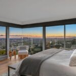 Jason Oppenheim Instagram - Just Listed - 8700 Franklin Ave. - $4,995,000 3 Bed / 3 Baths / 2,766 Sq. Ft. / 16,384 Lot Size Situated on its own promontory at the end of a quiet cul-de-sac street just above the Sunset Strip, this private mid-century home features unrivaled jetliner panoramic views of the entire city to the ocean. The swimmer's pool and outdoor patio evoke feelings of a five-star resort with an additional 20-foot waterfall, spa, and fire pit. Enter past the floor-to-ceiling front door to an open floor plan with a gorgeous living room, vaulted wood-beamed ceilings, a see-through fireplace, and a dining area with incredible views from every room. The sleek kitchen is complete with contemporary, top-of-the-line appliances. An additional bedroom, bathroom, and laundry room complete the main floor. A custom steel wall and floating staircase lead below to a large seating area and the luxurious owner's suite replete with a spa-like bathroom and walk-in closet, all opening to a massive deck. The third bedroom with an ensuite bath has floor-to-ceiling sliding doors perfect for an office or extra guest room. Detached 2-car garage and 2 uncovered parking spaces. The Sunset Strip