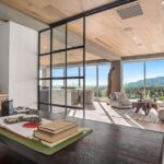 Jason Oppenheim Instagram - After two painstaking years and far too many millions of dollars, I have finally finished the remodel at the top floor of 7135 Hollywood Blvd., consisting of two beautiful penthouses, each offered at $7,495,000. Videos of each PH included in carousel. Penthouse East The most unique and exquisitely finished penthouse in all of Los Angeles, showcasing jetliner 360-degree views from the Hollywood sign to downtown and the ocean, as well as 2,885 sq. ft. of private outdoor deck space. Spanning half of the entire top floor in Hollywood's most exclusive full-service building (w/valet, doorman, and 24-hour security), Penthouse East has undergone a painstaking 2-year remodel to create the most sophisticated and mesmerizing residence in the entire city. Totaling 3,580 sq. ft. of interior living space with 3 bedrooms plus an office and 4 bathrooms, this penthouse is replete with an open living/dining room and built-in bar, floor-to-ceiling glass windows and sliding doors, exposed concrete beams, wide European oak flooring, and giant slabs of gorgeous Calacatta marble and Travertine limestone throughout. A chef’s kitchen is fitted with Gaggenau appliances and custom European cabinetry. The luxurious owner’s suite boasts a separate sitting area, fireplace, and ensuite bathroom with a free-standing soaking tub, spa-like shower, custom-cut Travertine sink, and an oversized showroom-style walk-in closet. The Penthouse offers smart home tech and two movie projector systems that drop from the ceiling, in both the living room and primary bedroom, with built-in surround sound. 4 dedicated parking spaces are included with the PH. Building amenities include a 24-hour valet, doorman, security, pool, recreation room, fitness center, dog park, and more. An unrivaled offering compared to other luxury condos when considering the design and quality of finishes, size/scale, unobstructed views, and outdoor deck space. Penthouse West (3,820 sq. ft. of interior living space with 1,685 sq. ft. exterior deck) is also available at $7,495,000, completing the entire top floor of the building. Thank you @whitegloveestates for the remodel and @vesta and @ashstaging for the amazing staging!! The Sunset Strip