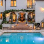 Jason Oppenheim Instagram - Just Listed - 1127 F Ave. - $29,995,000 5 Beds / 9 Baths / 15,067 Sq. Ft. / 25,265 Lot Size This stunning Spanish estate sits on a palm-lined promenade just 100 feet from the beach, on one of the largest lots in Coronado. The historical landmark encompasses a 14,142 square-foot main house, sprawling guest house, and private garden sanctuary with tranquil fountains and estancia. Originally built for business magnate W.A. Gunn, the four-bedroom (option for five), eight-bathroom abode features vintage Hollywood glamour adorned with state-of-the-art amenities for optimal luxury living space. Conceived by the illustrious Richard Requa in 1925, the previous owner preserved priceless historical heritage. Echoing the kind of extravagance that underscored the 1920s, “Coronado Castle” perfectly captures the era’s zeitgeist, rife with opulent tile flooring, ornate ironwork, stained-glass touches, and striking hand-hewn beams. A capacious kitchen is poised for entertaining, appointed with an 80-inch La Cornue range and rotisserie, double Subzero fridge, Miele steam oven, and coffee station, plus a wet bar. Preserving period details while meticulously updating the home to modern-day standards, historically accurate embellishments have been implemented throughout. The lavish basement is replete with a golf simulator, media room with bar, trophy room, 25-seat movie theater, 1,300+ sq. ft. world-class gym, and full spa with dry sauna, massage table, and ice bath. Inducing an air of timeless luxury, a stunning pool deck sets the stage for summertime soirees, complete with 250-year-old stonework, Moorish ironwork, a full outdoor kitchen, and dining estancia. The lush oasis includes 100-year-old rustic olive trees, three fountains, a putting green, a secret garden, and a dog run. Celebrating the spirit of Requa’s original design while fully embracing modern-day convenience, this historic home is a part of the Mills Act, which allows for reduced property taxes. Four-car garage with golf cart parking, the estate also includes an additional five coveted off-street parking spots a rarity in beach enclaves. Co-listed with @clementsgroupre Coronado, California