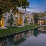 Jason Oppenheim Instagram - Just Listed - 1375 N. Doheny Dr. - $28,500,000 5 Beds / 9 Baths / 10,613 Sq. Ft. / 17,438 Lot Size Recently gracing the prestigious cover of Architectural Digest, this estate stands as an embodiment of timeless sophistication, meticulously curated from materials all over the world to create one of the most special homes in all of Los Angeles. Discreetly concealed beyond a privately gated driveway, an oversized motor court is laid with 200+ year-old reclaimed cobblestone from the historic streets of Boston. Experience the epitome of refined living with an open floor plan, double-height ceilings, and palatial steel-framed Crittal sliding glass doors which seamlessly unite the interior/outdoor spaces including a serene pool, covered patio, and verdant lawn. The sensuous chef’s kitchen is an epicurean haven boasting custom bronze-patinated cabinets, top-of-the-line appliances including floating burners by Pitt, and 20 slabs of book-matched Calacatta marble bearing an Rorschach-like allure. The owner’s suite bath, inspired by Jean Michel Frank - a French art deco architect known for his soft, undulating lines - stands as the quintessence of unparalleled elegance and decadence; every square inch has been cocooned in 40 slabs of Calacatta Breccia Capraia, (an impossibly rare marble from Italy that was used throughout Italian churches for hundreds of years) including the steam shower’s built-in chaise lounge to the monolithic tub hewn from a single block of stone, all paired with opulent Waterworks fixtures. Bespoke amenities include an office wrapped in an envelope of reclaimed French Oak, a state-of-the-art theater, wine cellar, gym, recreation room, private library, unrivaled security, and audio/visual integration. Unquestionably the most impressively crafted and composed property available, tailored for the most discerning buyer desiring perfection. Listed by @themarybonnet @jasonoppenheim