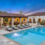 Jason Oppenheim Instagram - Record-Breaking Sale: The most expensive home to ever sell in Coronado - 1127 F Ave. - $28,000,000 5 Beds / 9 Baths / 14,054 Sq. Ft. / 25,265 Lot Size This stunning Spanish estate sits on a palm-lined promenade just 100 feet from the beach, on one of the largest lots in Coronado. Originally built for business magnate W.A. Gunn, the four-bedroom (option for five), eight-bathroom abode features vintage Hollywood glamour adorned with state-of-the-art amenities for optimal luxury living space, replete with castle-like characteristics. Conceived by the illustrious Richard Requa in 1925, the previous owner preserved priceless historical heritage. Dominated by an impressive turret that acts as an entrance hall, the home’s exotic allure is undeniable, revealing a stunning foyer with a spiral staircase and striking, hand-hewn beams. Echoing the kind of extravagance that underscored the 1920s, “Coronado Castle” perfectly captures the era’s zeitgeist, rife with opulent tile flooring, ornate ironwork, and stained-glass touches. An immaculately hand-painted coffered ceiling dominates the formal dining room, punctuating the voluminous expanse that bleeds outward to the pool deck via a trio of custom steel glass doors. Grounded in reclaimed 18th-century European terracotta tile, Spanish embellishments abound. Preserving period details while meticulously updating the home to modern-day standards, historically accurate embellishments have been implemented throughout. Designed with a grand staircase and soaring ceilings, the voluminous basement boasts a golf simulator, media room with bar, trophy room, 25-seat movie theater with projector, 1,300+ sq. ft. world-class gym, and full spa with dry sauna, massage table, and ice bath. Inducing an air of timeless luxury, a stunning pool deck sets the stage for summertime soirees, complete with 250-year-old stonework, Moorish ironwork, a full outdoor kitchen, and dining estancia. The lush oasis includes 100-year-old rustic olive trees, three fountains, a putting green, a secret garden, and a dog run. Co-listed with @clementsgroupre Coronado Island, Coronado