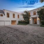 Jason Oppenheim Instagram - Just Listed - 1375 N. Doheny Dr. - $28,500,000 5 Beds / 9 Baths / 10,613 Sq. Ft. / 17,438 Lot Size Recently gracing the prestigious cover of Architectural Digest, this estate stands as an embodiment of timeless sophistication, meticulously curated from materials all over the world to create one of the most special homes in all of Los Angeles. Discreetly concealed beyond a privately gated driveway, an oversized motor court is laid with 200+ year-old reclaimed cobblestone from the historic streets of Boston. Experience the epitome of refined living with an open floor plan, double-height ceilings, and palatial steel-framed Crittal sliding glass doors which seamlessly unite the interior/outdoor spaces including a serene pool, covered patio, and verdant lawn. The sensuous chef’s kitchen is an epicurean haven boasting custom bronze-patinated cabinets, top-of-the-line appliances including floating burners by Pitt, and 20 slabs of book-matched Calacatta marble bearing an Rorschach-like allure. The owner’s suite bath, inspired by Jean Michel Frank - a French art deco architect known for his soft, undulating lines - stands as the quintessence of unparalleled elegance and decadence; every square inch has been cocooned in 40 slabs of Calacatta Breccia Capraia, (an impossibly rare marble from Italy that was used throughout Italian churches for hundreds of years) including the steam shower’s built-in chaise lounge to the monolithic tub hewn from a single block of stone, all paired with opulent Waterworks fixtures. Bespoke amenities include an office wrapped in an envelope of reclaimed French Oak, a state-of-the-art theater, wine cellar, gym, recreation room, private library, unrivaled security, and audio/visual integration. Unquestionably the most impressively crafted and composed property available, tailored for the most discerning buyer desiring perfection. Listed by @themarybonnet @jasonoppenheim