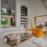 Jason Oppenheim Instagram - Just Listed - 1375 N. Doheny Dr. - $28,500,000 5 Beds / 9 Baths / 10,613 Sq. Ft. / 17,438 Lot Size Recently gracing the prestigious cover of Architectural Digest, this estate stands as an embodiment of timeless sophistication, meticulously curated from materials all over the world to create one of the most special homes in all of Los Angeles. Discreetly concealed beyond a privately gated driveway, an oversized motor court is laid with 200+ year-old reclaimed cobblestone from the historic streets of Boston. Experience the epitome of refined living with an open floor plan, double-height ceilings, and palatial steel-framed Crittal sliding glass doors which seamlessly unite the interior/outdoor spaces including a serene pool, covered patio, and verdant lawn. The sensuous chef’s kitchen is an epicurean haven boasting custom bronze-patinated cabinets, top-of-the-line appliances including floating burners by Pitt, and 20 slabs of book-matched Calacatta marble bearing an Rorschach-like allure. The owner’s suite bath, inspired by Jean Michel Frank - a French art deco architect known for his soft, undulating lines - stands as the quintessence of unparalleled elegance and decadence; every square inch has been cocooned in 40 slabs of Calacatta Breccia Capraia, (an impossibly rare marble from Italy that was used throughout Italian churches for hundreds of years) including the steam shower’s built-in chaise lounge to the monolithic tub hewn from a single block of stone, all paired with opulent Waterworks fixtures. Bespoke amenities include an office wrapped in an envelope of reclaimed French Oak, a state-of-the-art theater, wine cellar, gym, recreation room, private library, unrivaled security, and audio/visual integration. Unquestionably the most impressively crafted and composed property available, tailored for the most discerning buyer desiring perfection. Listed by @themarybonnet @jasonoppenheim
