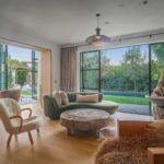 Jason Oppenheim Instagram - Just Listed - 1375 N. Doheny Dr. - $28,500,000 5 Beds / 9 Baths / 10,613 Sq. Ft. / 17,438 Lot Size Recently gracing the prestigious cover of Architectural Digest, this estate stands as an embodiment of timeless sophistication, meticulously curated from materials all over the world to create one of the most special homes in all of Los Angeles. Discreetly concealed beyond a privately gated driveway, an oversized motor court is laid with 200+ year-old reclaimed cobblestone from the historic streets of Boston. Experience the epitome of refined living with an open floor plan, double-height ceilings, and palatial steel-framed Crittal sliding glass doors which seamlessly unite the interior/outdoor spaces including a serene pool, covered patio, and verdant lawn. The sensuous chef’s kitchen is an epicurean haven boasting custom bronze-patinated cabinets, top-of-the-line appliances including floating burners by Pitt, and 20 slabs of book-matched Calacatta marble bearing an Rorschach-like allure. The owner’s suite bath, inspired by Jean Michel Frank - a French art deco architect known for his soft, undulating lines - stands as the quintessence of unparalleled elegance and decadence; every square inch has been cocooned in 40 slabs of Calacatta Breccia Capraia, (an impossibly rare marble from Italy that was used throughout Italian churches for hundreds of years) including the steam shower’s built-in chaise lounge to the monolithic tub hewn from a single block of stone, all paired with opulent Waterworks fixtures. Bespoke amenities include an office wrapped in an envelope of reclaimed French Oak, a state-of-the-art theater, wine cellar, gym, recreation room, private library, unrivaled security, and audio/visual integration. Unquestionably the most impressively crafted and composed property available, tailored for the most discerning buyer desiring perfection. Listed by @themarybonnet @jasonoppenheim