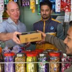 Jeff Bezos Instagram - Amazon partners with thousands of kirana stores all over India as delivery points. It’s good for customers, and it helps the shop owners earn additional income. Got to visit one in Mumbai. Thank you, Amol, for letting me deliver a package. #MSME Mumbai, Maharashtra