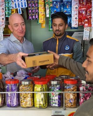 Jeff Bezos Instagram - Amazon partners with thousands of kirana stores all over India as delivery points. It’s good for customers, and it helps the shop owners earn additional income. Got to visit one in Mumbai. Thank you, Amol, for letting me deliver a package. #MSME