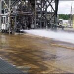 Jeff Bezos Instagram – First hotfire of our #BE7 lunar landing engine just yesterday at Marshall Space Flight Center. Data looks great and hardware is in perfect condition. What you’re seeing at the bottom is a water cooling system and the green flame is the ignition system. The engine plume you see is very clear because the fuel is hydrogen. Test went full planned duration – 35 seconds. Kudos to the whole @BlueOrigin team and grateful to @NASA_Marshall for all the help!