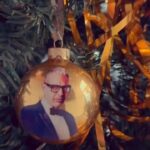 Jeff Goldblum Instagram - Jeff Goldblum is watching you…unwrapping presents…kissing under the mistletoe….getting another pair of socks…our Christmas Waltz playing festively the whole time! Deck the Halls! Link in bio. 🎅🏼🎹🎺🎄🕯✨