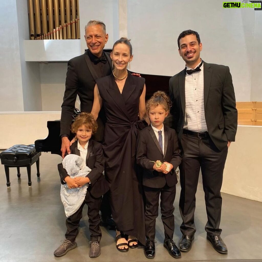 Jeff Goldblum Instagram - A heroic and brilliant mom, wonderful teacher Kevin Anto, and the whole family in a glorious recital (Charlie’s very first performance), all of us on a whirlwind creative adventure. Beyond my wildest dreams, I’m more in love every day!!! @emiliegoldblum 👸🏻👨‍👩‍👦‍👦🎼🎹🌪🎨🗺🌌🪐💗