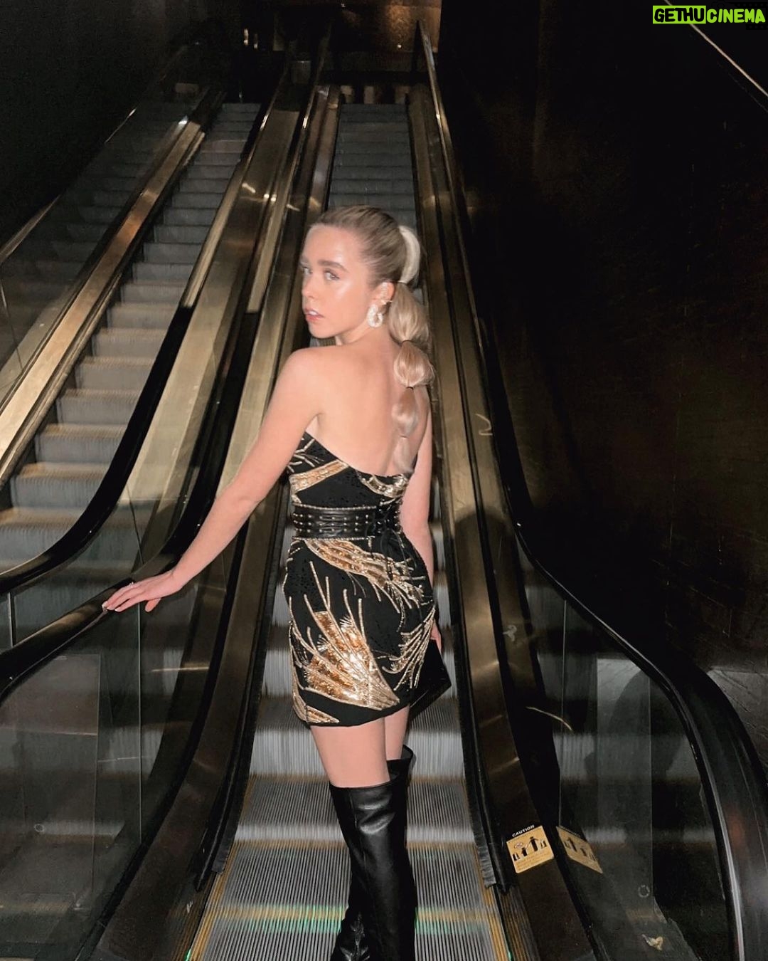 Jenna Davis Instagram - Little do you know I’m scared of escalators 💀 hair: @hairbybradleyleake stylist: @styledbylmc boots: @charlesdavidshoes dress: @steven_khalil belt: @nadinemerabi earrings: @sterlingforever eat cuffs: @maisonmiru rings: @maisonmiru @sterlingforever @heymaeve @peggyli Westwood
