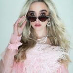 Jenna Davis Instagram - Legally Blonde💕 pc: @ashleyrobertsphotos hair/mua: @nixeyartistry stylist: @styledbylmc feather top: @ivanyoungofficial skirt: @ivanyoungofficial coat: @ivanyoungofficial heels: @sam_edelman jewlery: @dangelojoyeria sunglasses: @asos Los Angeles, California