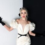Jenna Davis Instagram - Yours truly🖤 p/c: @ashleyrobertsphotos hair & mua: @nixeyartistry stylist: @styledbylmc dress: @houseofcb boots: @charlesdavidshoes bow & gloves: @shopakira earrings: @heyMaeve Culver City, California
