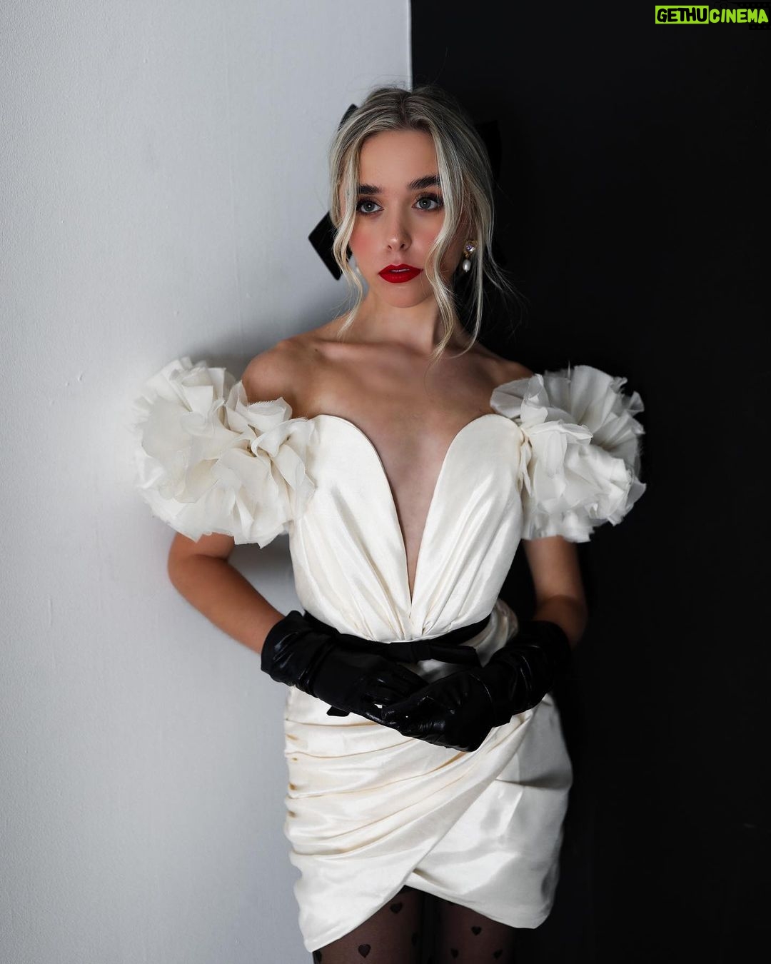 Jenna Davis Instagram - Yours truly🖤 p/c: @ashleyrobertsphotos hair & mua: @nixeyartistry stylist: @styledbylmc dress: @houseofcb boots: @charlesdavidshoes bow & gloves: @shopakira earrings: @heyMaeve Culver City, California