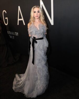 Jenna Davis Instagram - Last night was a dream🖤 I can’t wait for y’all to @meetm3gan in theaters JAN 3RD! Beyond grateful for @gerardjohnstone @universalpictures @blumhouse @susanboyajian for believing in me. 

stylist: @styledbylmc 
dress: @sophiecouture 
ring: @dangelojoyeria 
shoes: @kennethcole 
earrings: @nataliemillajewelry
choker: @adornmonde 
hair/mua: @nixeyartistry

@blumhouse @universal #m3gan #blumhouse #universal