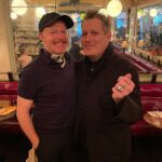 Jesse Tyler Ferguson Instagram - Look who it is! It’s @imisaacmizrahi! I’m thrilled to have him as my guest on this week’s episode of Dinner’s on Me. 🍽️🎧🫶 . Over omelets and quiche at @pastisnyc in Meatpacking, I talk with Isaac about dinner parties with Nora Ephron, being a young gay designer during the height of the AIDS crisis, and career risks he's taken that not everyone believed in. I had to add a few of my favorite iconic Isaac Mizrahi photographs here as well! Have a listen—the episode is linked in my bio. (This episode was recorded on September 10, 2023.) Pastis