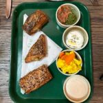 Jesse Tyler Ferguson Instagram – Y’all. It’s @sarabareilles week this week on my podcast, Dinner’s on Me! ❤️🎧🍽️ Over Israeli pastries and Tunisian salad at @kfar_bk in Brooklyn, she shared what it was like being bullied as a kid, how she copes with her anxiety, and why it was so important to wear a specific dress to the Tony Awards. Get ready to listen to a fantastic convo—you’re in for a treat. You know where to go—link in bio! (This episode was recorded on June 14, 2023). K’Far Brooklyn